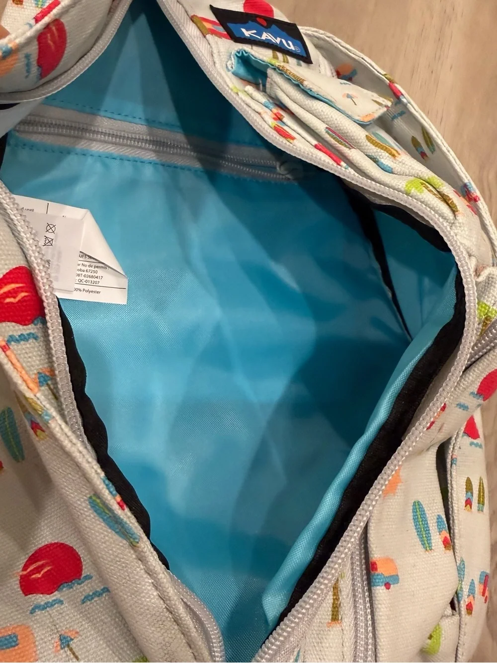 Kavu Sling Bag in Light Gray with Pink and Teal Camper Print